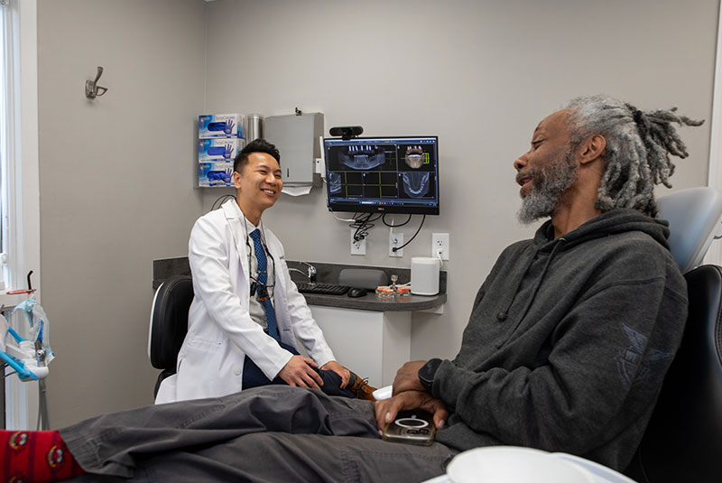Doctor consulting with patient