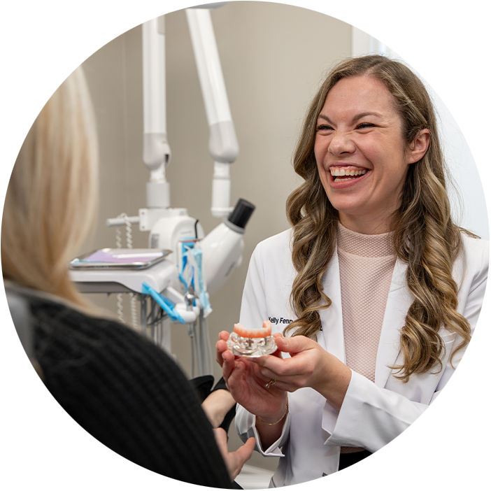 Doctor Consulting With Patient
