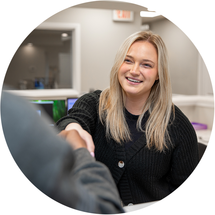 Team member shaking Patients Hand