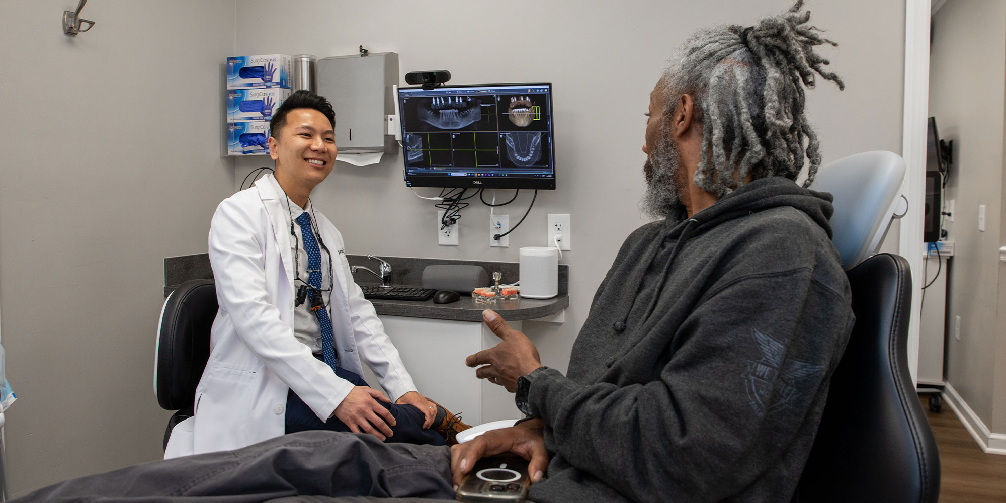 Doctor consulting with Patients